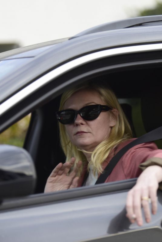 KIRSTEN DUNST Out Smoking in Her Car in Los Angeles 02/27/2024