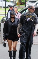 KOURTNEY KARDASHIAN and Travis Barker at Cafe Smith and Deli in Melbourne 02/28/2024