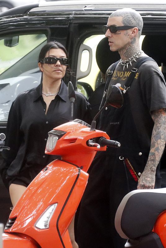 KOURTNEY KARDASHIAN and Travis Barker at Cafe Smith and Deli in Melbourne 02/28/2024