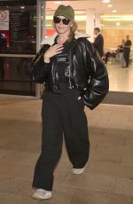 KYLIE MINOGUE Arrives at Sydney Airport 03/19/2024