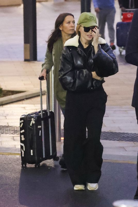 KYLIE MINOGUE Arrives at Sydney Airport 03/19/2024