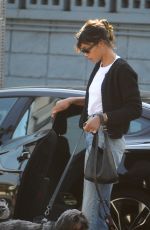 LAURA HARRIER Out with Her Dog in West Hollywood 03/20/2024