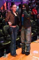 LILY-ROSE DEPP and 070 SHAKE at Los Angeles Lakers Game 03/10/2024