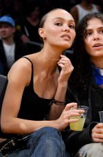 LILY-ROSE DEPP and 070 SHAKE at Los Angeles Lakers Game 03/10/2024