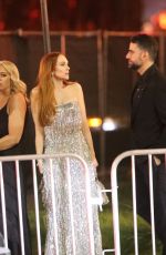 LINDSAY LOHAN and Bader Shammas Leaves Vanity Fair Oscars Party in Beverly Hills 03/10/2024