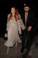 LINDSAY LOHAN and Bader Shammas on a Dinner Date in Los Angeles 03/16/2024