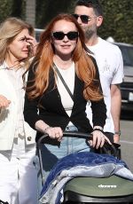 LINDSAY LOHAN Out for a Family Lunch at La Escala in Beverly Hills 03/16/2024
