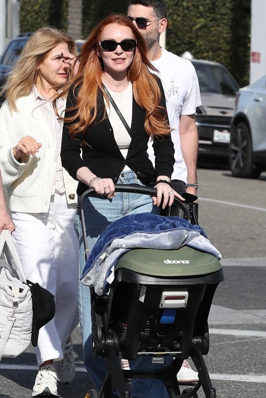 LINDSAY LOHAN Out for a Family Lunch at La Escala in Beverly Hills 03/16/2024