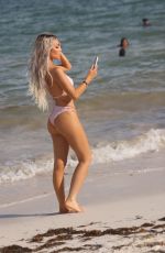 LISA OPIE in Bikini at a Beach in Cancun 03/04/2024