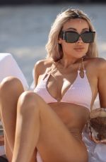 LISA OPIE in Bikini at a Beach in Cancun 03/04/2024