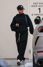 LORI HARVEY Out Shopping with a Friend at Bottega Veneta in Los Angeles 03/27/2024