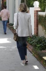 MELANIE GRIFFITH Out for Solo Lunch at Melrose Place in Los Angeles 03/09/2024