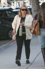 Pregnant HILARY DUFF Leaves a Hair Salon in Los Angeles 03/08/2024