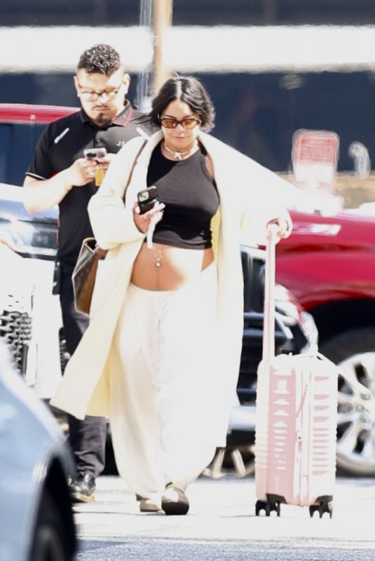 Pregnant VANESSA HUDGENS at LAX Airport in Los Angeles 03/11/2024