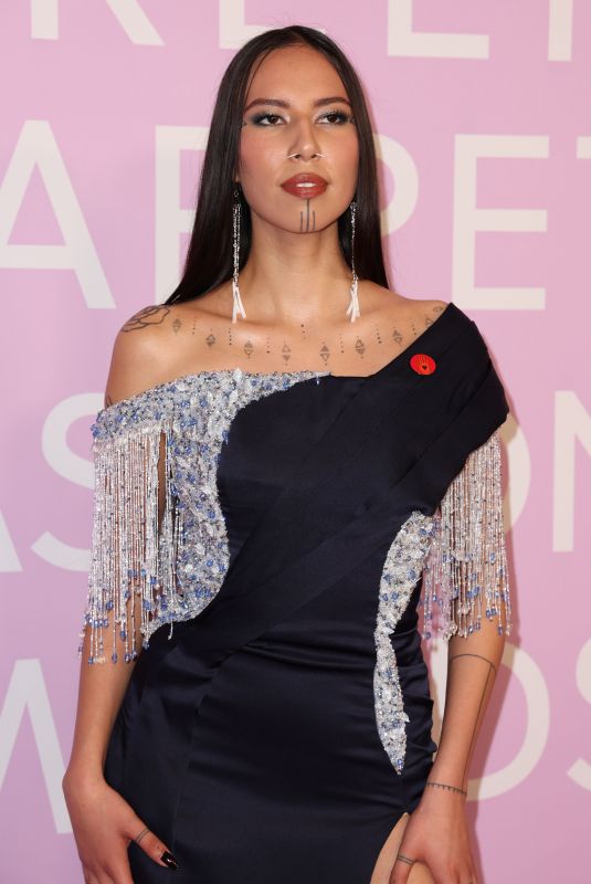 QUANNAH CHASINGHORSE at 2024 Green Carpet Fashion Awards in Los Angeles 03/06/2024