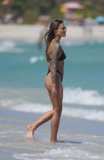 SOPHIA THOMALLA in Bikini ata a Beach in Miami Beach 03/20/2024