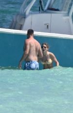 TAYLOR SWIFT in Bikini and Travis Kelce at a Beach in Bahamas 03/21/2024