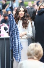 TERRI SEYMOUR Arrives at America
