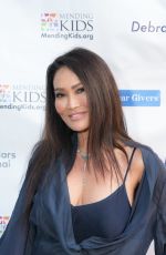TIA CARRERE at Mending Kids Gala in Los Angeles 03/16/2024