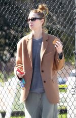 WHITNEY PORT Leaves a Business Meeting Enjoying a Treat on the go 03/08/2024