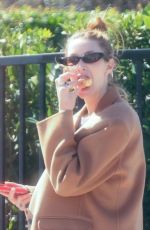 WHITNEY PORT Leaves a Business Meeting Enjoying a Treat on the go 03/08/2024