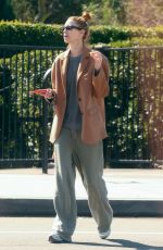 WHITNEY PORT Leaves a Business Meeting Enjoying a Treat on the go 03/08/2024