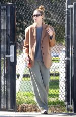 WHITNEY PORT Leaves a Business Meeting Enjoying a Treat on the go 03/08/2024