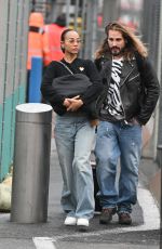 ZOE SALDANA and Marco Perego Arrives at JFK Airport in New York 03/27/2024