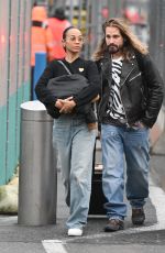 ZOE SALDANA and Marco Perego Arrives at JFK Airport in New York 03/27/2024