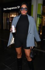 ABBIE HOLBORN Arrives at Liverpool One for the Shein Pop Up Shop 04/18/2024
