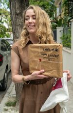 AMBER HEARD Receives Presents on Her 38th Birthday Outside Her Home in Madrid 04/22/2024
