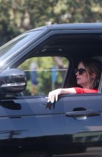 ASHLEY BENSON Smoke a Cigarette while Stuck in Traffic on Sunset Strip in West Hollywood 04/24/2024