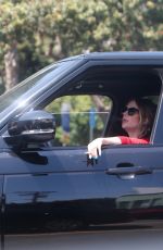 ASHLEY BENSON Smoke a Cigarette while Stuck in Traffic on Sunset Strip in West Hollywood 04/24/2024