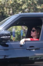ASHLEY BENSON Smoke a Cigarette while Stuck in Traffic on Sunset Strip in West Hollywood 04/24/2024