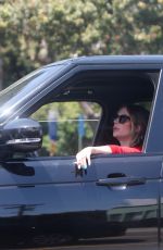 ASHLEY BENSON Smoke a Cigarette while Stuck in Traffic on Sunset Strip in West Hollywood 04/24/2024