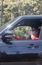 ASHLEY BENSON Smoke a Cigarette while Stuck in Traffic on Sunset Strip in West Hollywood 04/24/2024