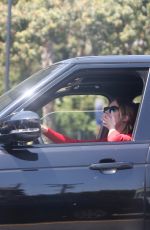 ASHLEY BENSON Smoke a Cigarette while Stuck in Traffic on Sunset Strip in West Hollywood 04/24/2024