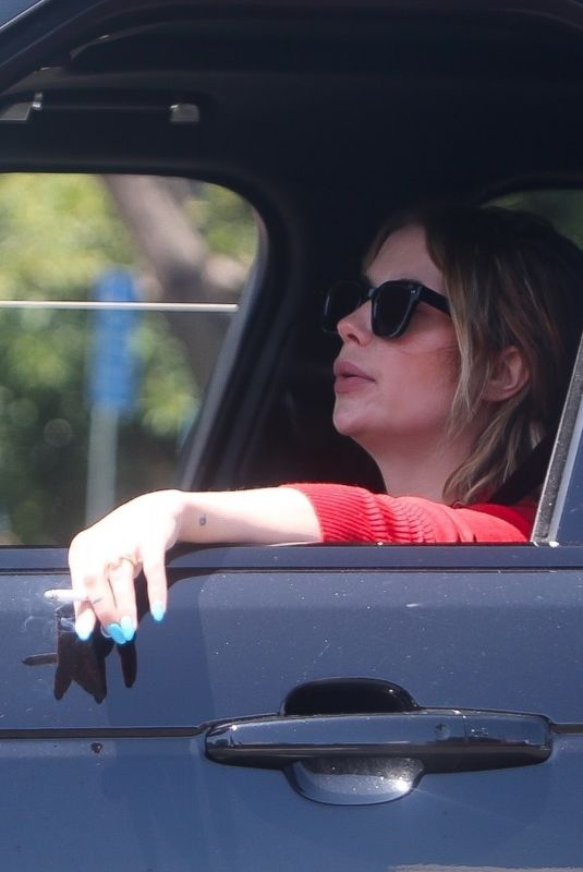 ASHLEY BENSON Smoke a Cigarette while Stuck in Traffic on Sunset Strip in West Hollywood 04/24/2024