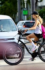 CATHY HUMMELS at a Bike Ride Along Miami Beach Boardwalk 04/07/2024