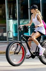 CATHY HUMMELS at a Bike Ride Along Miami Beach Boardwalk 04/07/2024