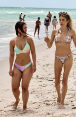 CATHY HUMMELS in Bikini on the Beach with a Friend in Miami 04/07/2024