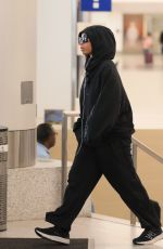 CHLOE BAILEY Arrives at LAX Airport in Los Angeles 04/02/2024