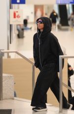 CHLOE BAILEY Arrives at LAX Airport in Los Angeles 04/02/2024