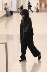 CHLOE BAILEY Arrives at LAX Airport in Los Angeles 04/02/2024