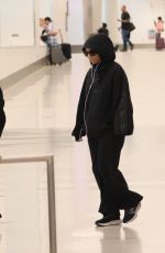 CHLOE BAILEY Arrives at LAX Airport in Los Angeles 04/02/2024