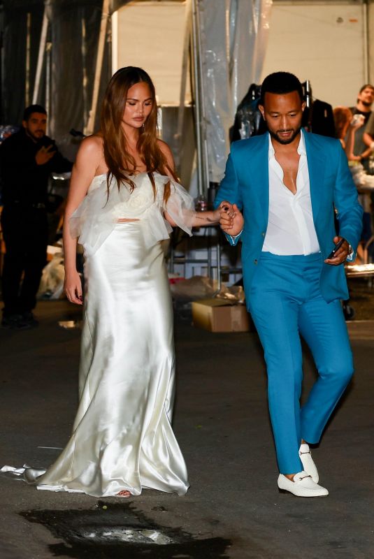 CHRISSY TEIGEN and John Legend at a Charity Event Hosted by Prada in Beverly Hills 04/09/2024