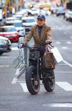 DIANE KRUGER Out for a Ride on Her Electric Bike in New York 04/26/2024