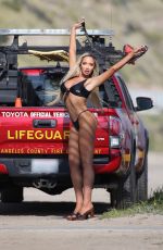ELIZABETH CHEVALIER in Bikini at a Photoshoot in Malibu 04/01/2024