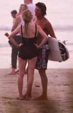 ELLIE GOULDING and Armando Perez at a Beach in Costa Rica 03/29/2024