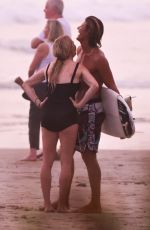 ELLIE GOULDING and Armando Perez at a Beach in Costa Rica 03/29/2024